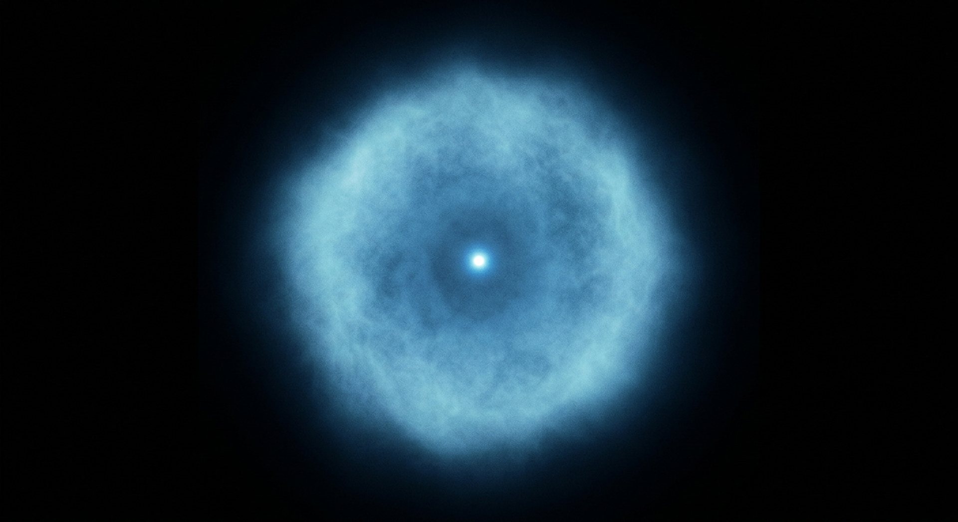 Représentation artistique d'un nuage électronique autour d'un noyau minuscule, halo bleu diffus, échelle indiquée